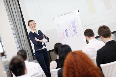 business people group at meeting seminar presentation in brigt c