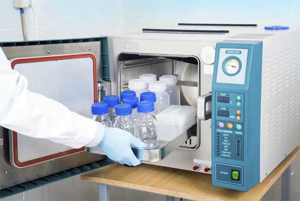 insertion-of-plastic-bottles-in-autoclave-for-sterilization