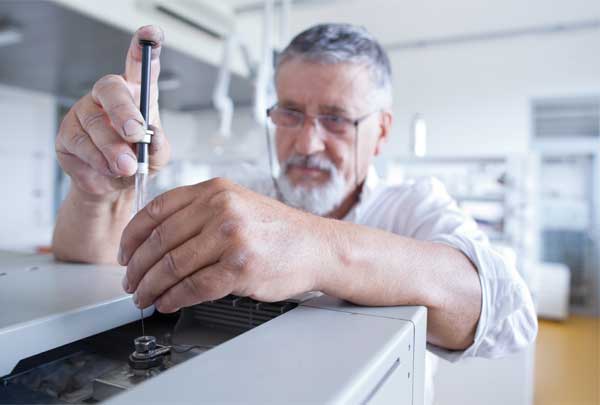 Syringe injection of sample into Gas Chromatograph