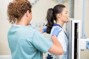 Preparing patient for chest X-ray examination