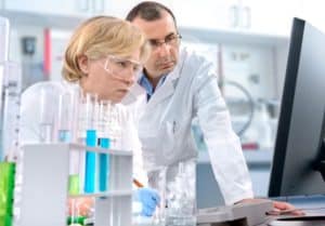 Analysts discussing approaches to improve their work productivity