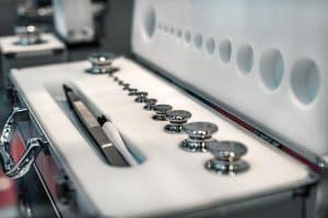 Box containing standard weights
